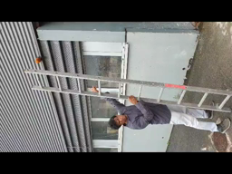Using a ladder.