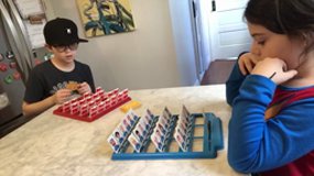 Kids play guess who 